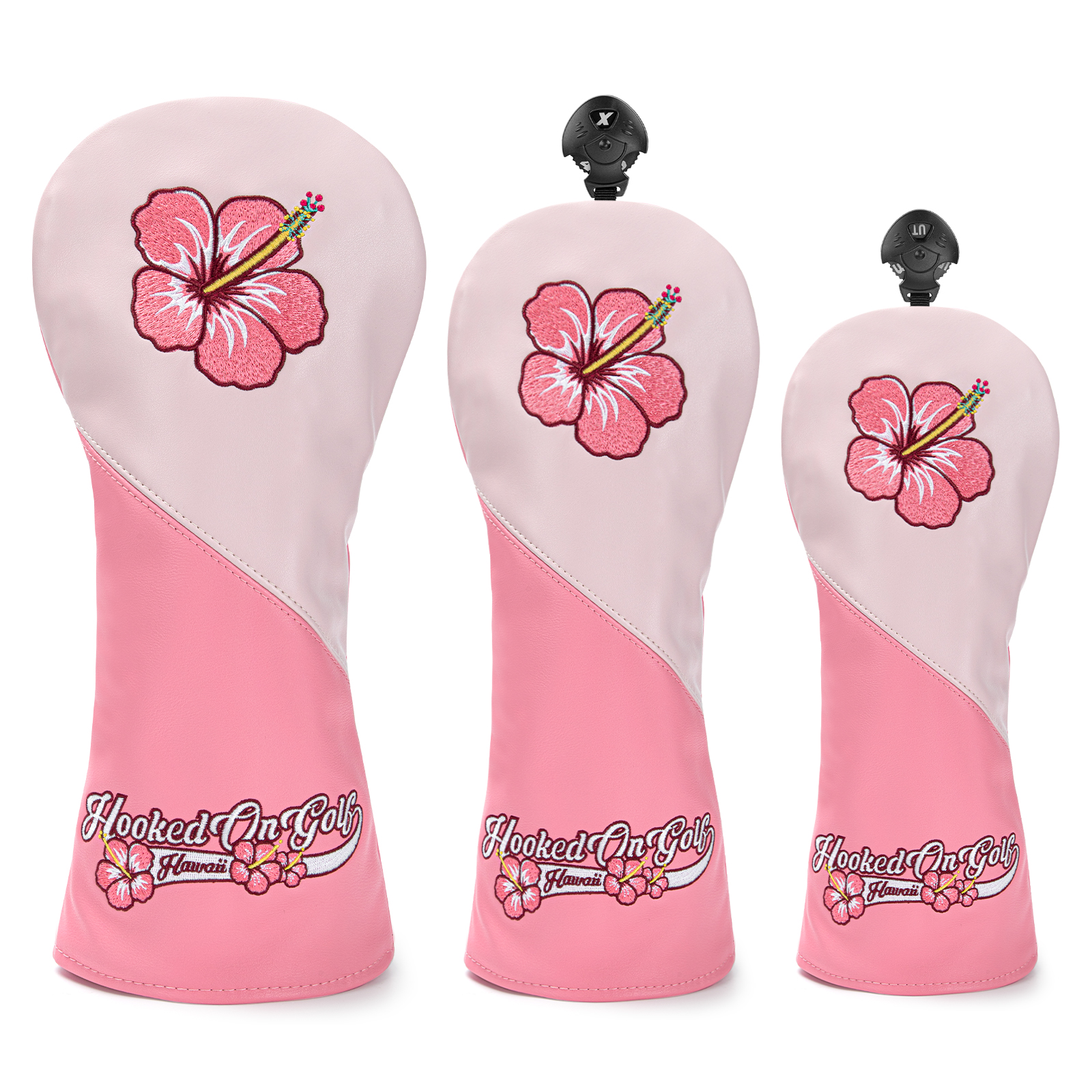 Three pink covers with pale pink panels and hibiscus flower graphics, shown upright in different sizes.