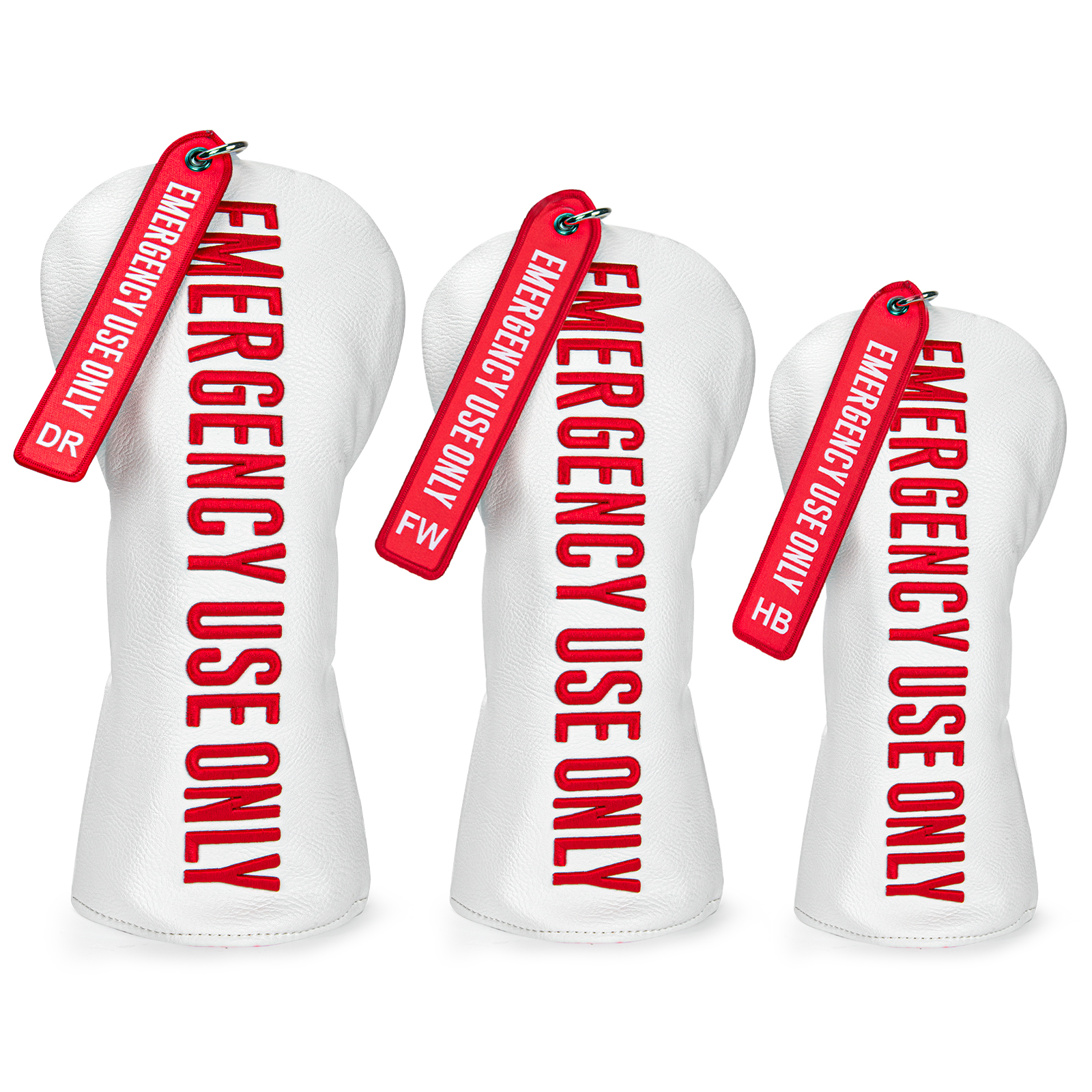 Three white golf club covers with long red bands and visible red text reading “EMERGENCY USE ONLY,” shown upright together.