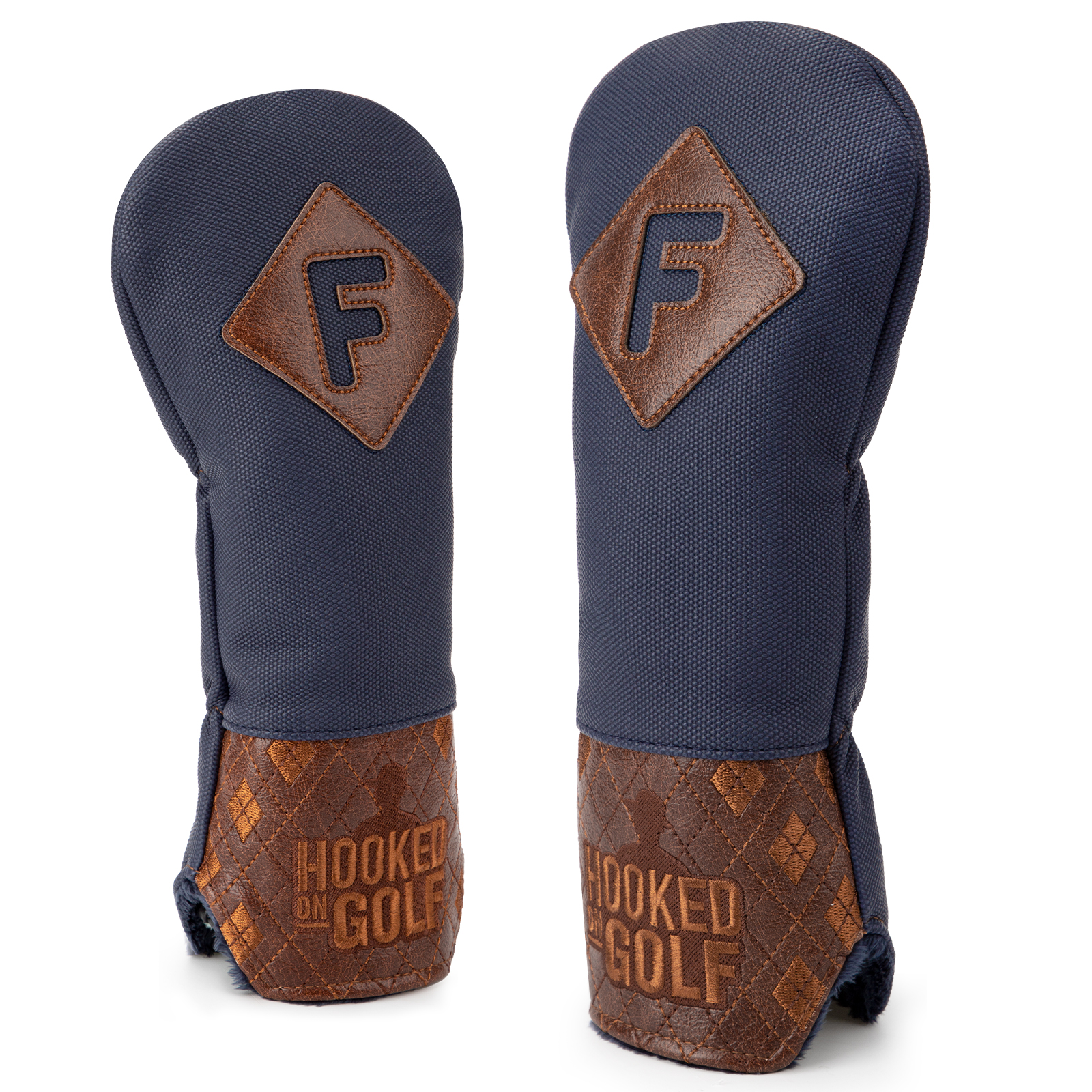 Two navy covers with brown patches marked “F,” shown from slightly different angles.
