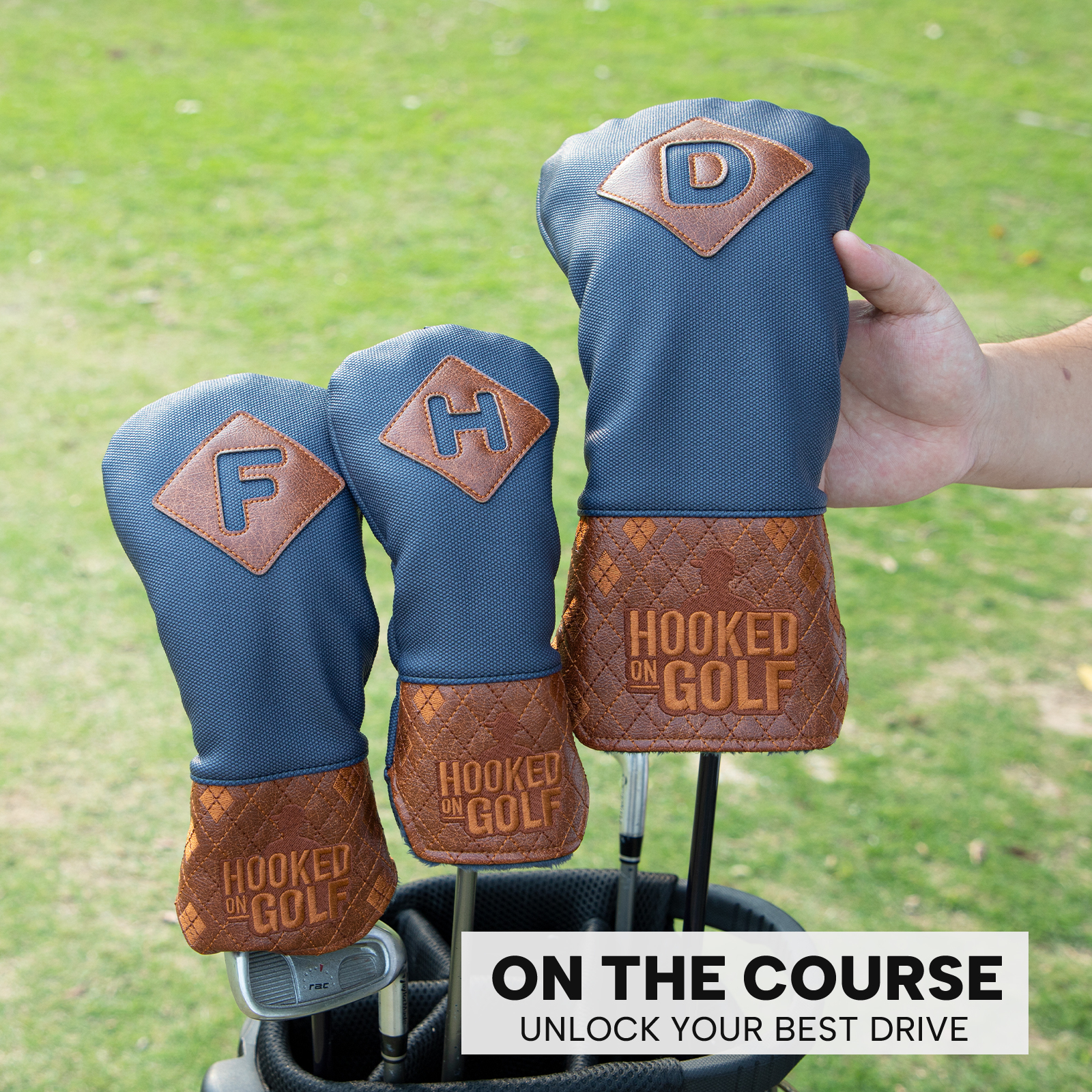 Three navy-and-brown covers are held above a golf bag on grass; “HOOKED ON GOLF” is visible on the lower panels.