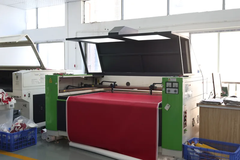 Industrial machine with an open red work bed