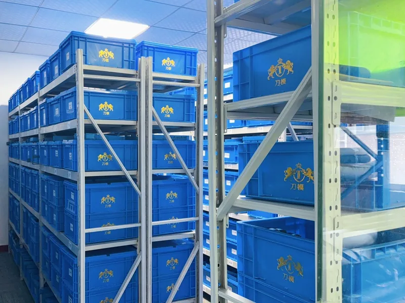 Blue storage containers on shelving