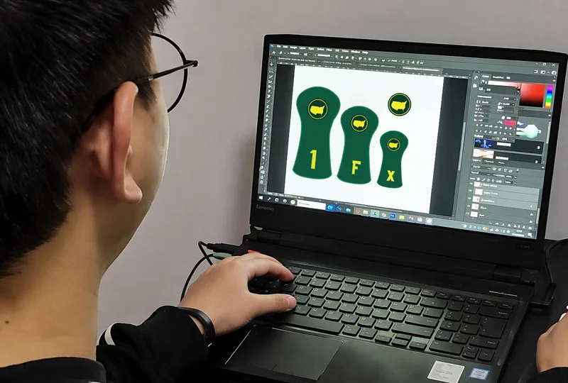 Golf-cover concepts displayed on a laptop screen
