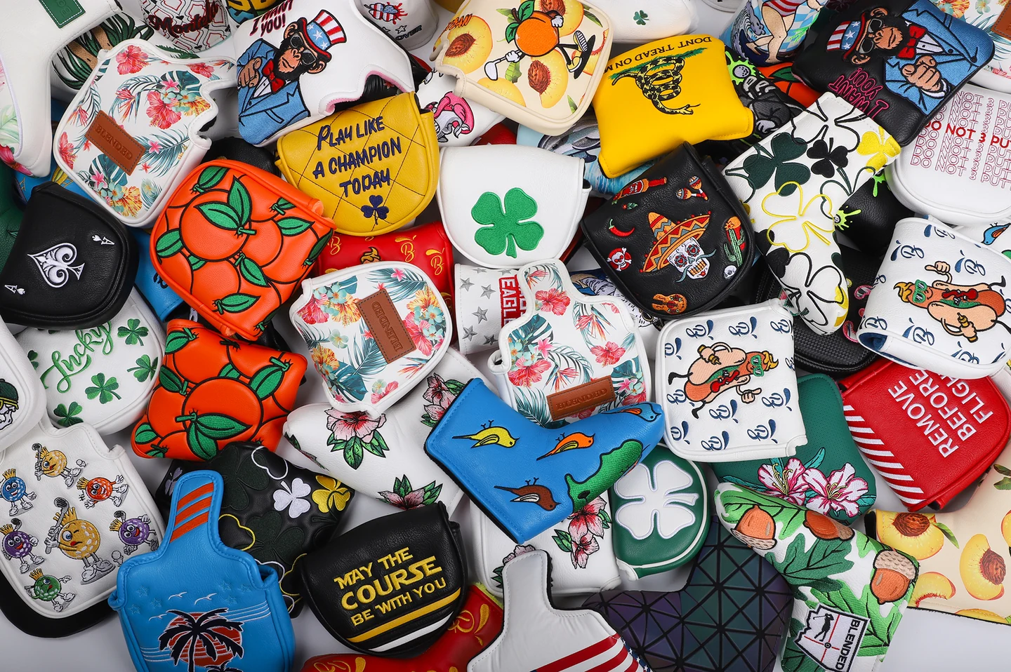 Collection of colorful custom golf headcovers